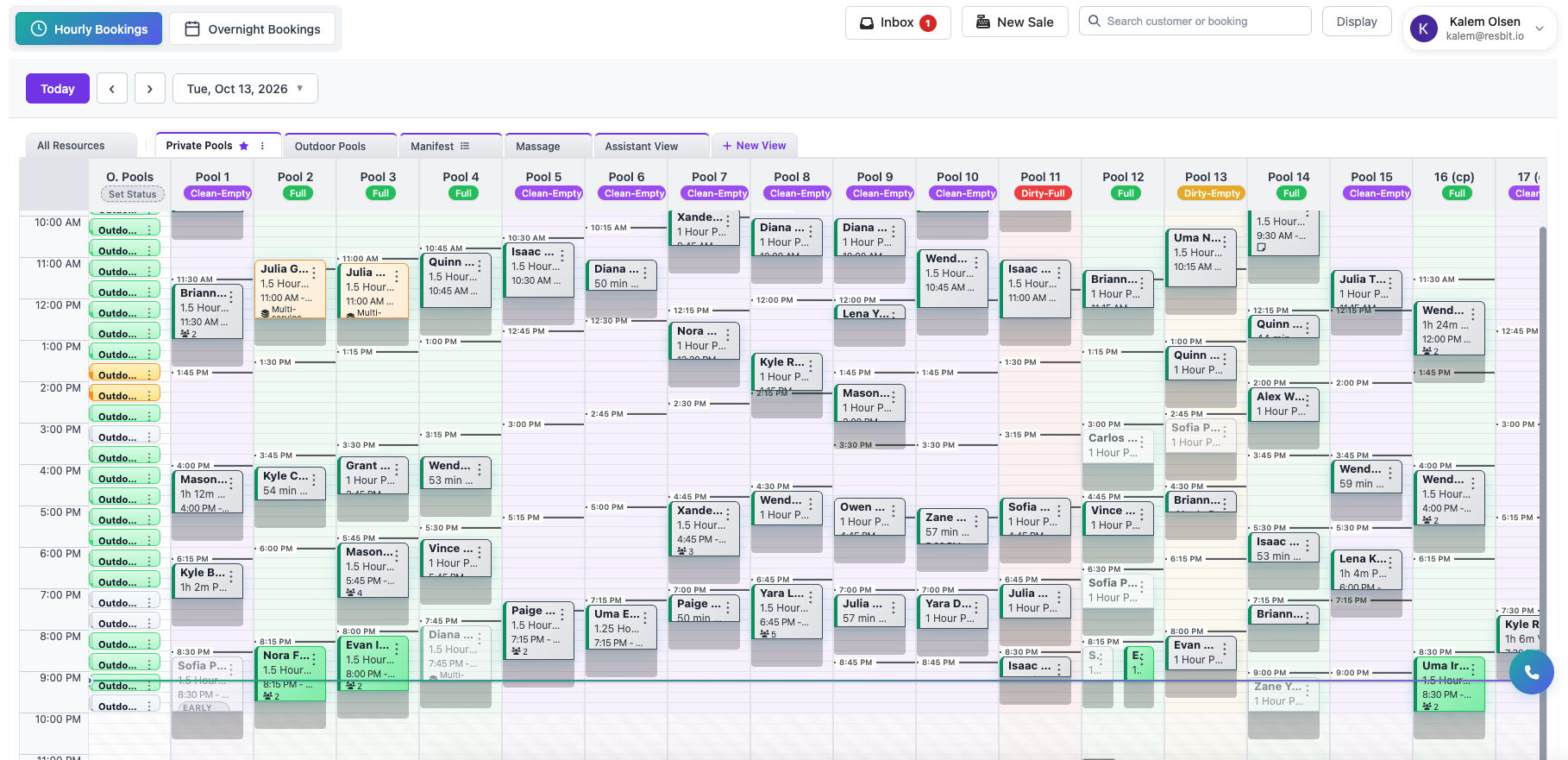 Wide hourly calendar with multiple resources and bookings across a busy day